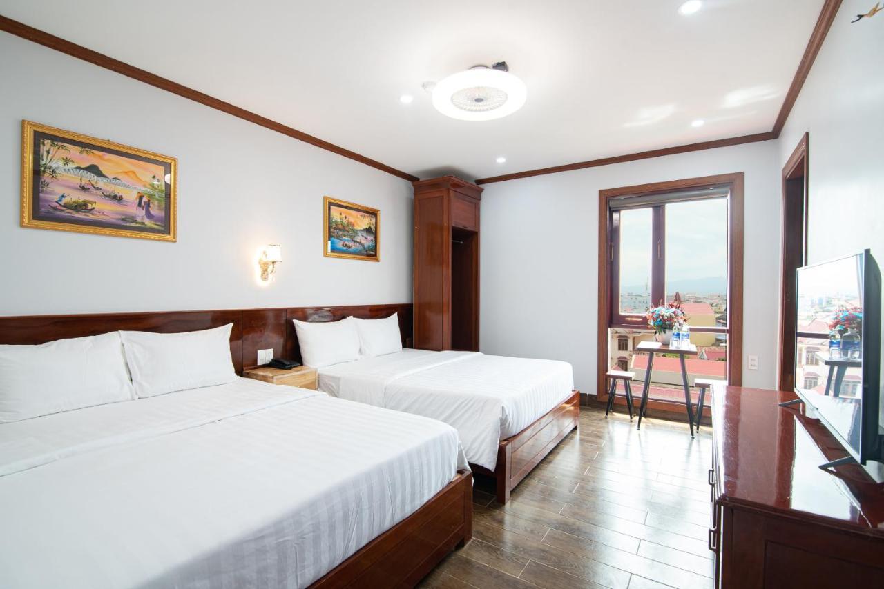 Minh Quang Hotel Донг Хой Екстериор снимка