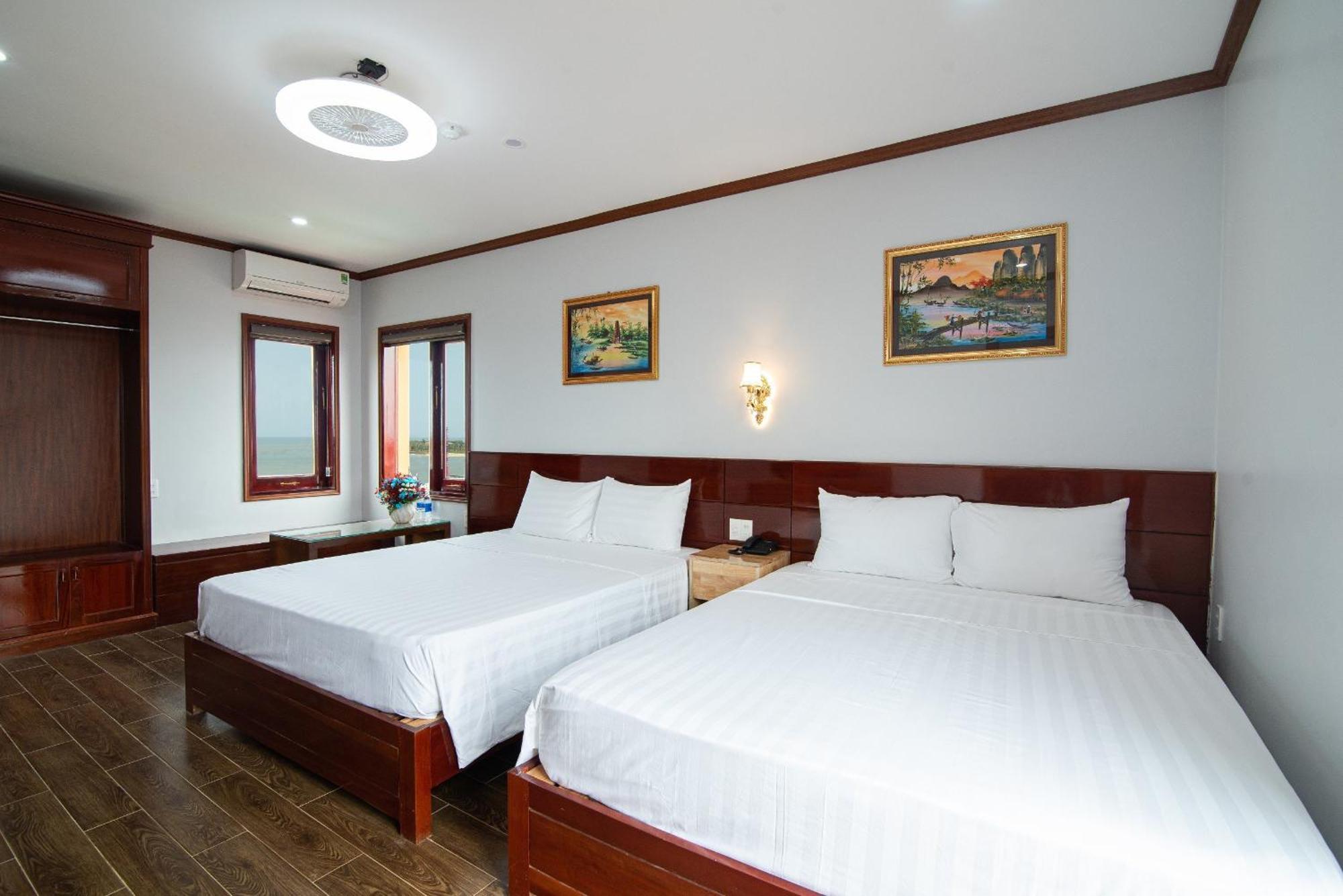 Minh Quang Hotel Донг Хой Екстериор снимка